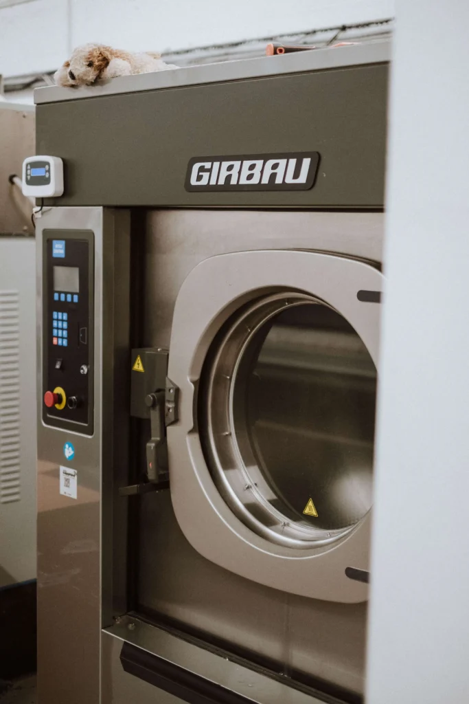 Commercial washing machine mid-cycle at the Southampton facility